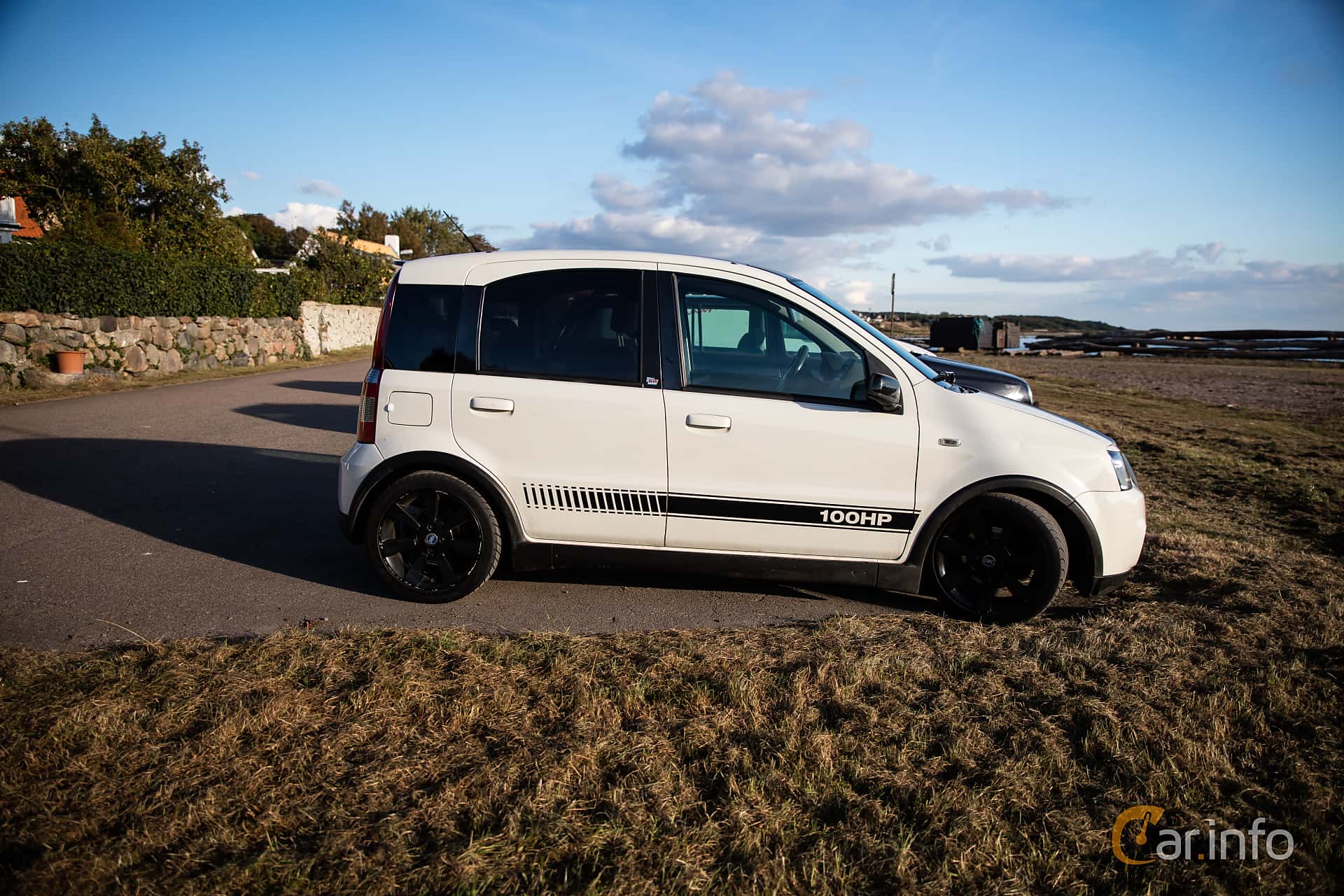Fiat panda 169, beige, driving off-road in the mountains on Craiyon