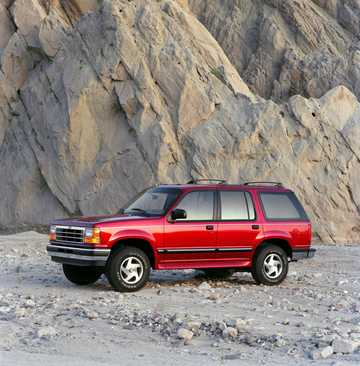 Front/Side  of Ford Explorer 4.0 V6 OHV 4WD Automatic, 157hp, 1991 