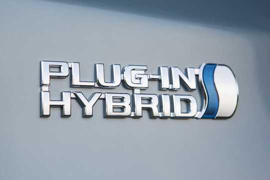 Close-up of Toyota Prius Plug-in Hybrid 1.8 VVT-i + 3JM Plug-in CVT, 136hp, 2012 