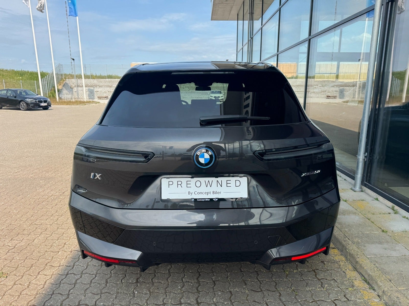 BMW iX xDrive50, 524hp, 2024