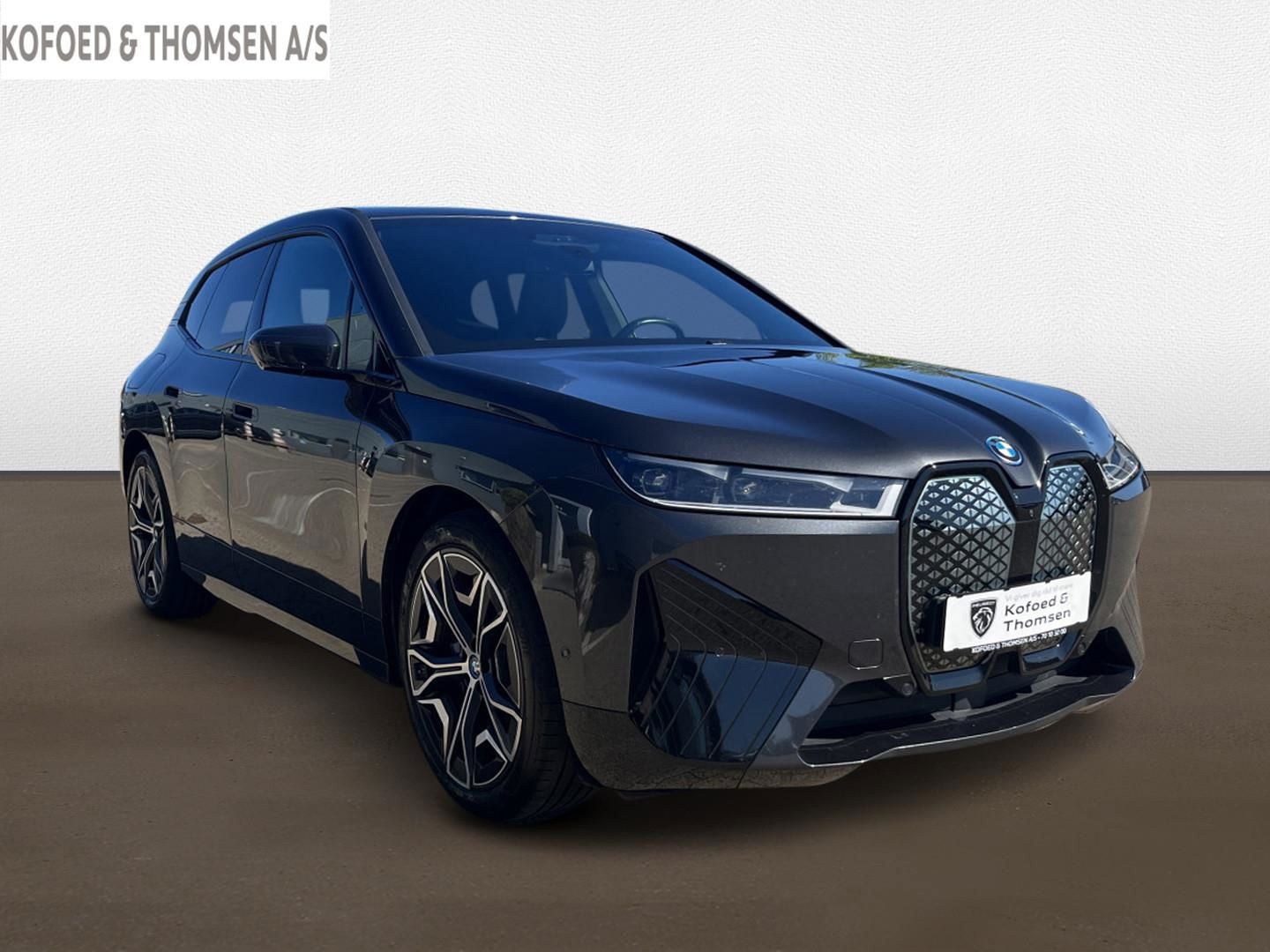 BMW iX xDrive50, 524hp, 2024