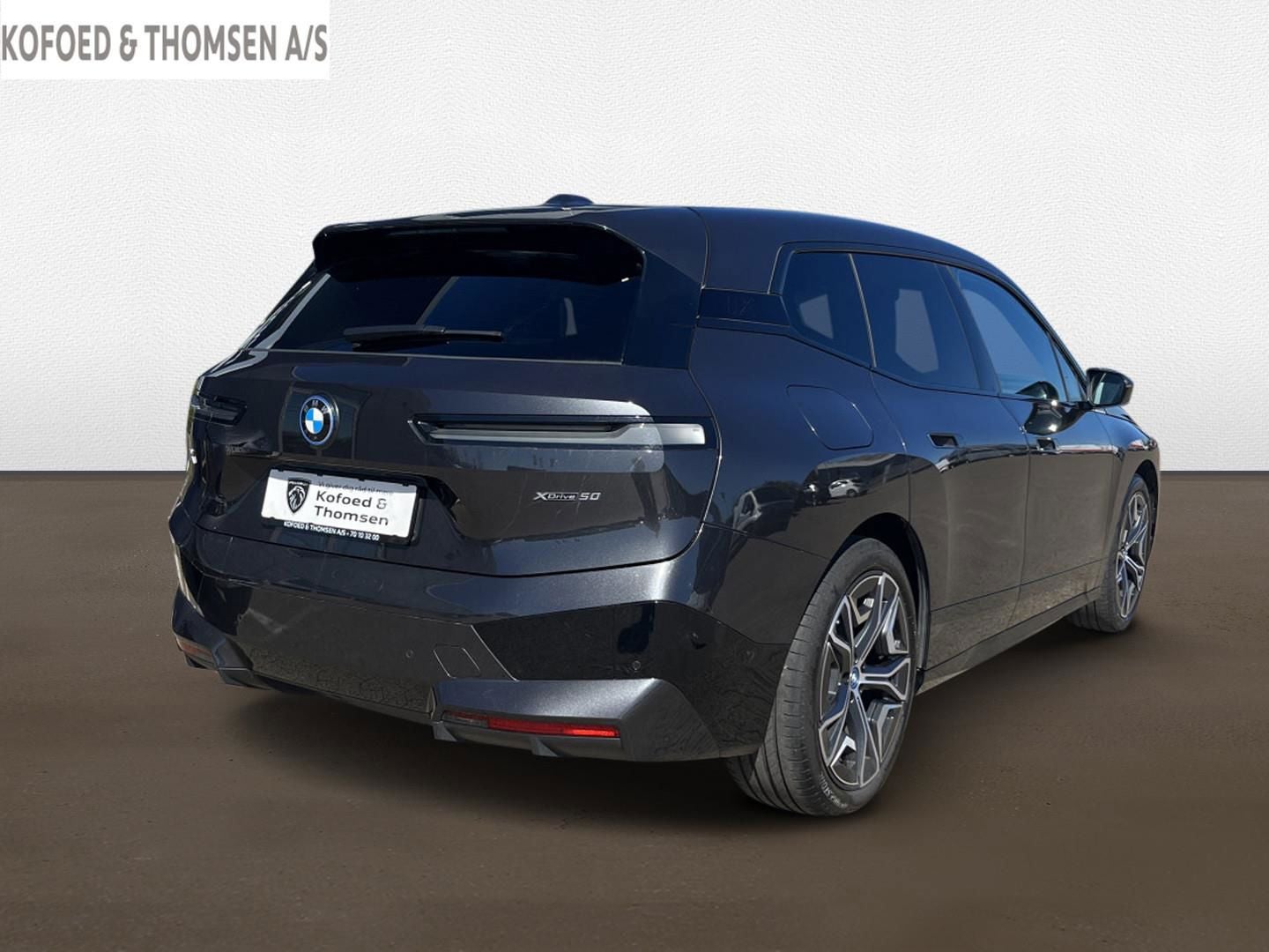 BMW iX xDrive50, 524hp, 2024
