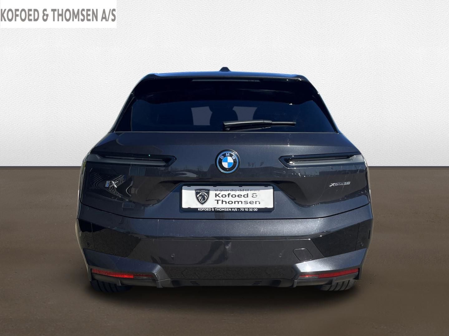 BMW iX xDrive50, 524hp, 2024